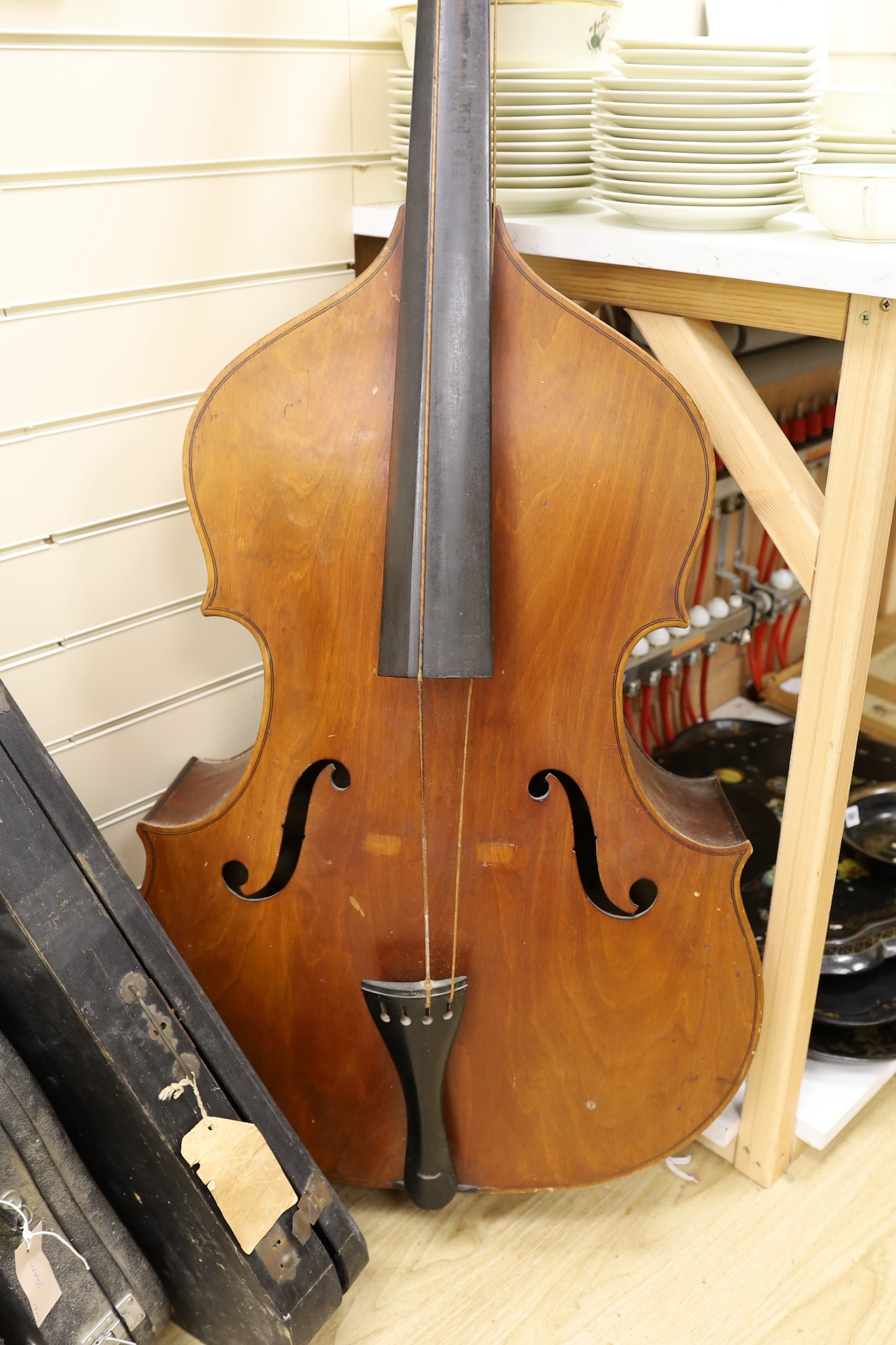 A double bass and three various violins, double bass 165cms high